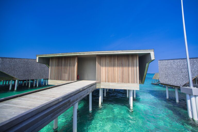 Top places to visit in Maldives showcasing overwater villas, white sand beaches and luxury island resorts