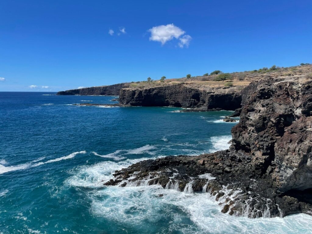a view of the ocean from a cliff